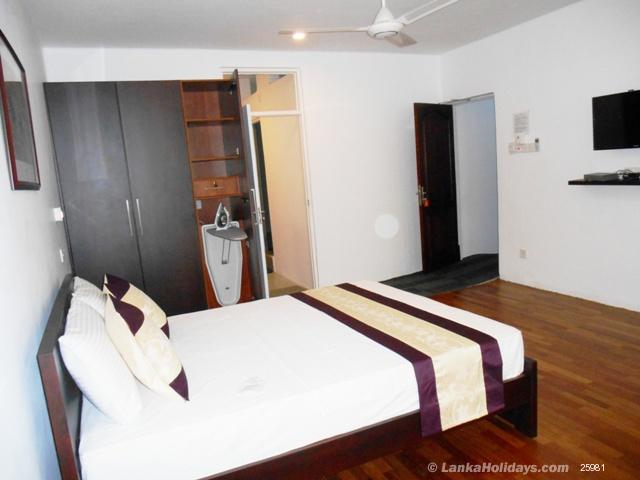 Wardrobe with ironing board & lockable d